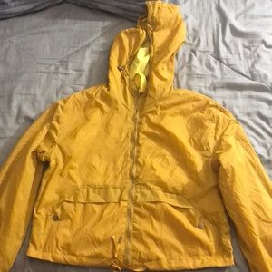 A yellow zip up jacket size medium